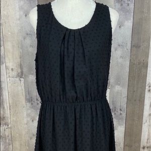 Beautiful Elle sleeveless black dress.